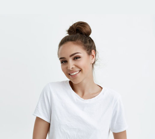 waist-up-portrait-cheerful-attractive-modern-woman-with-bun-smiling-broadly-camera-expressing-positive-emotions_176420-17181